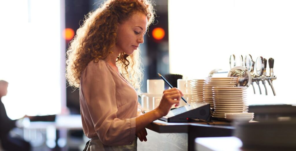 Woman ordering at a coffee shop